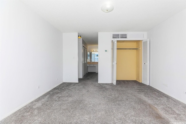1561 Kanunu St Unit 1205, Honolulu, HI 96814 - unfurnished bedroom featuring carpet