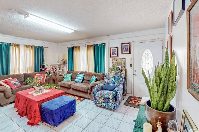 living room with a textured ceiling and light tile patterned floors