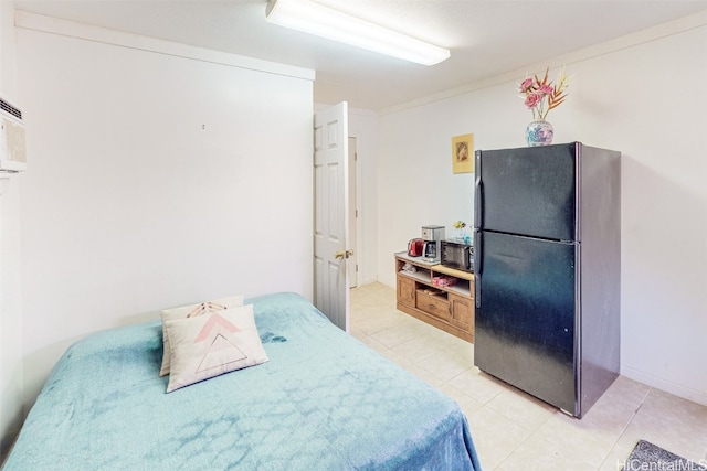 tiled bedroom featuring black fridge