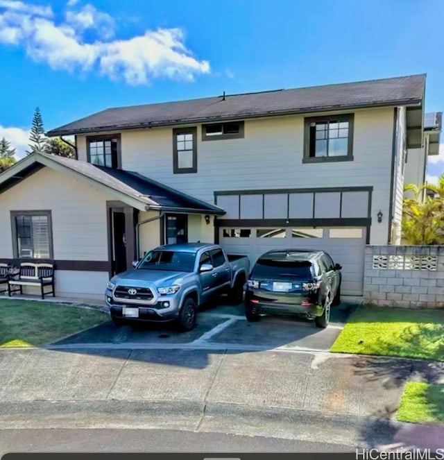 view of front of property featuring a garage