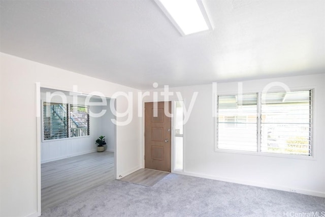 unfurnished room featuring carpet floors