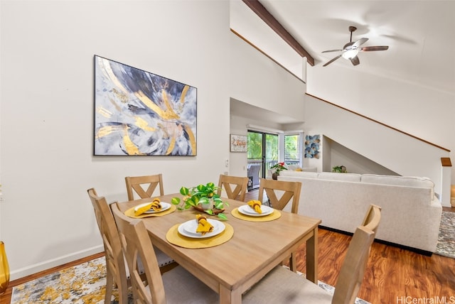 dining space featuring dark hardwood / wood-style floors and ceiling fan