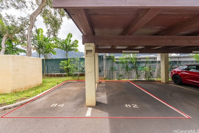 view of parking featuring a carport