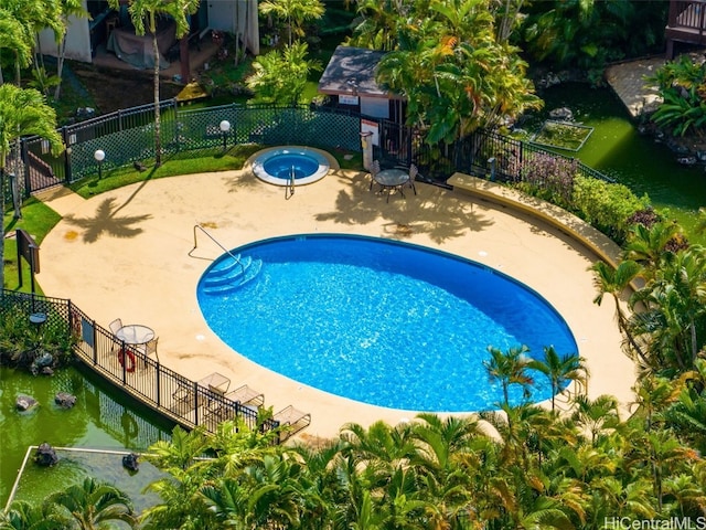 view of swimming pool featuring a patio