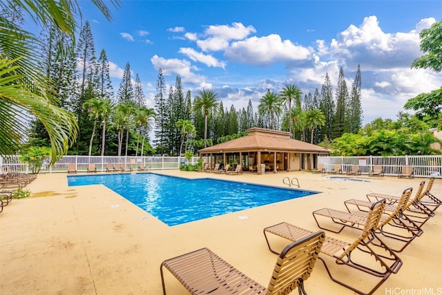 view of swimming pool featuring a patio