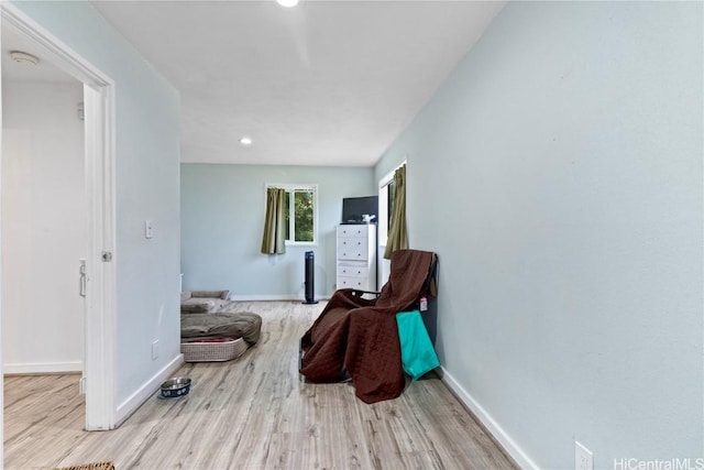 living area with light hardwood / wood-style floors