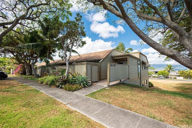 view of front of house with a front yard