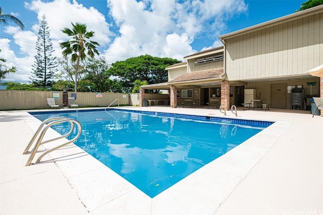 view of pool featuring a patio area