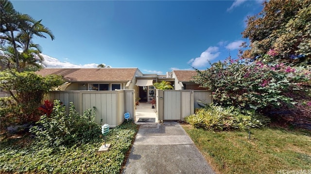 exterior space with a gate and fence