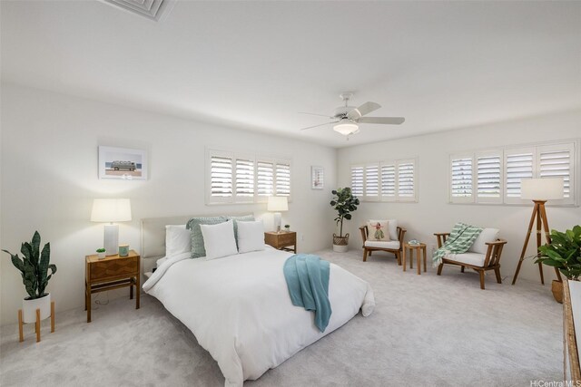 2897 Kalawao St Unit 61, Honolulu, HI 96822 - carpeted bedroom featuring a ceiling fan