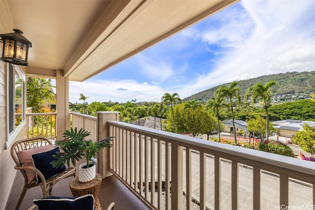 balcony featuring a mountain view