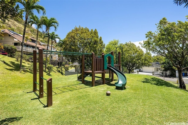 view of playground with a yard