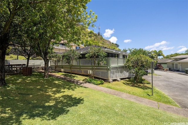 view of yard featuring a deck