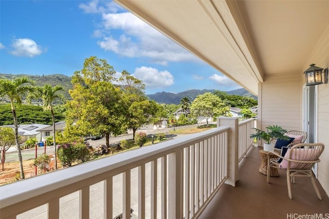 balcony featuring a mountain view