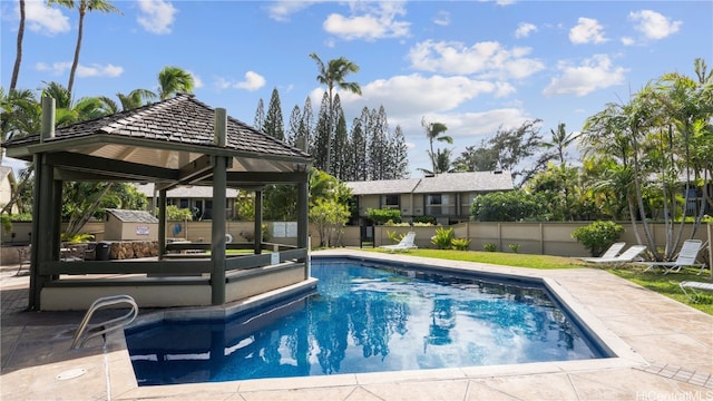 view of pool featuring a gazebo and a patio area