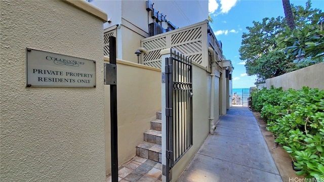 view of property exterior featuring a water view