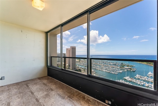 empty room featuring a water view