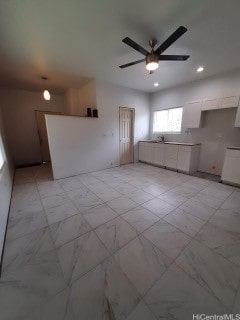 interior space featuring ceiling fan