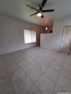 spare room featuring ceiling fan