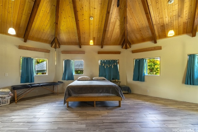 bedroom featuring beam ceiling, high vaulted ceiling, light wood-type flooring, and wooden ceiling