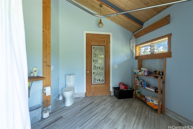 interior space with wooden ceiling, lofted ceiling, and light wood-type flooring