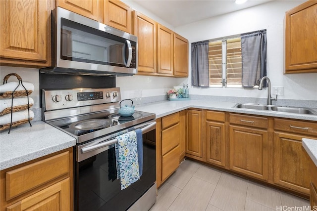 kitchen featuring sink and appliances with stainless steel finishes