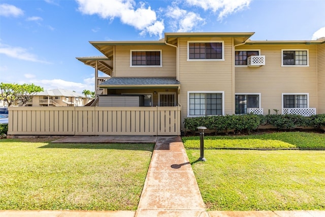 view of front facade with a front lawn