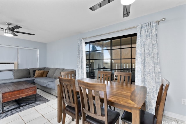 dining area featuring light tile patterned flooring and ceiling fan