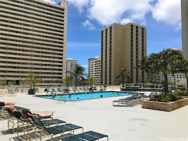 view of swimming pool featuring a patio