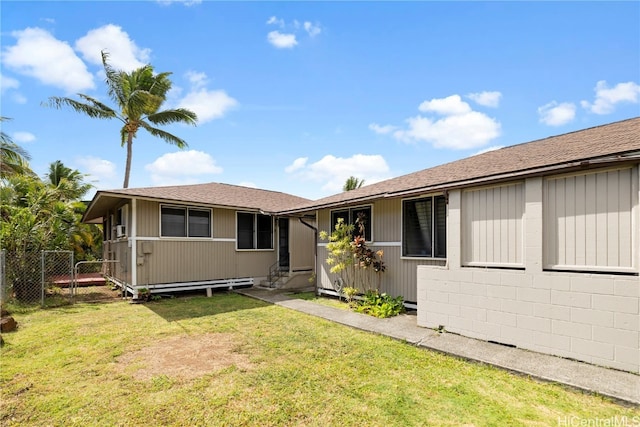 view of front of property with a front lawn