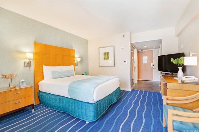 410 Atkinson Dr Unit 932, Honolulu, HI 96814 - bedroom with baseboards and dark carpet