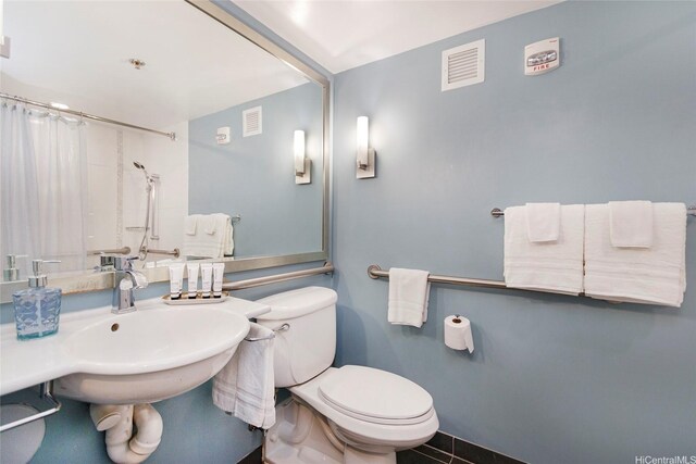 410 Atkinson Dr Unit 932, Honolulu, HI 96814 - full bath with a shower with curtain and tile patterned floors