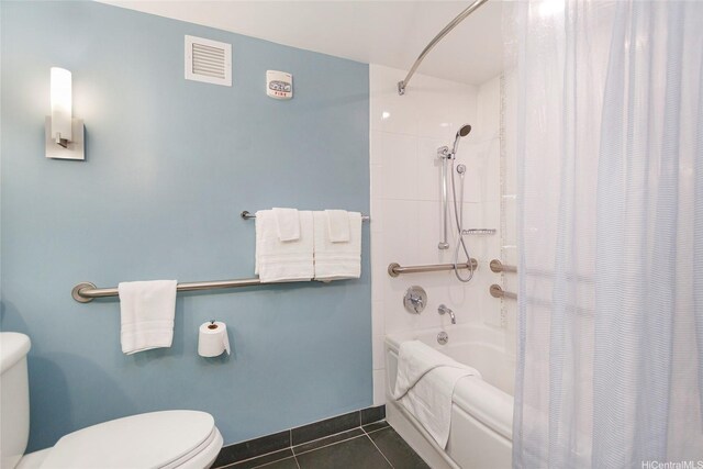410 Atkinson Dr Unit 932, Honolulu, HI 96814 - bathroom featuring shower / bath combo with shower curtain and tile patterned flooring