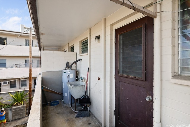 exterior space featuring electric water heater