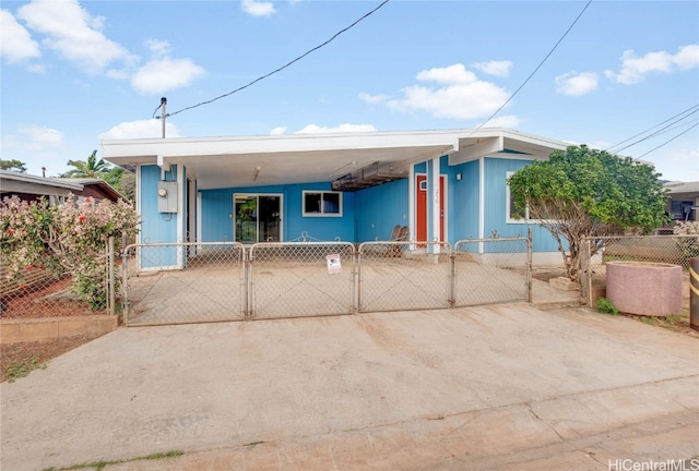 view of front facade with a carport