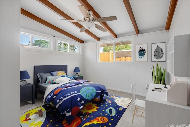 carpeted bedroom featuring lofted ceiling with beams, multiple windows, and ceiling fan