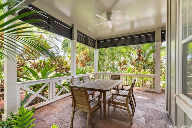 sunroom with ceiling fan and a healthy amount of sunlight