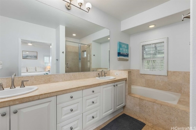 bathroom with vanity, shower with separate bathtub, and tile patterned floors