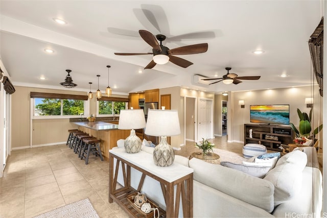 tiled living room featuring lofted ceiling and ceiling fan