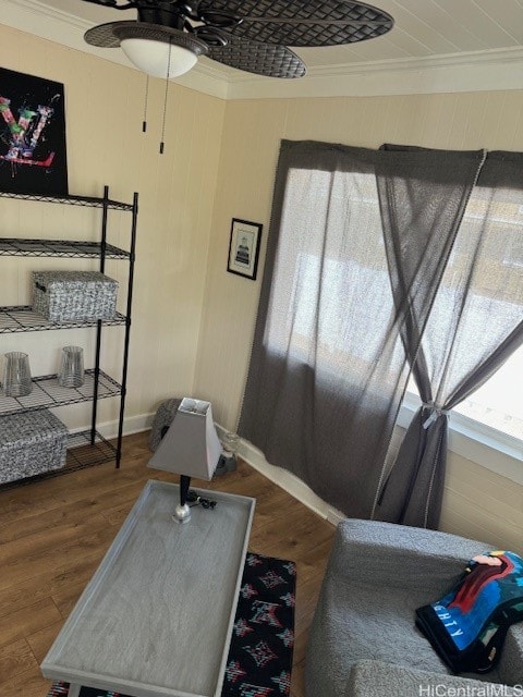 bedroom featuring dark wood-type flooring, ceiling fan, and crown molding