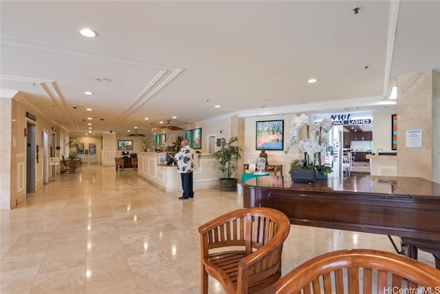 interior space featuring crown molding, elevator, and ceiling fan