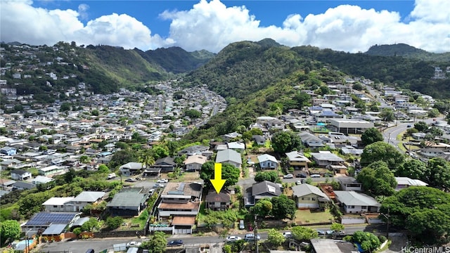 birds eye view of property featuring a mountain view