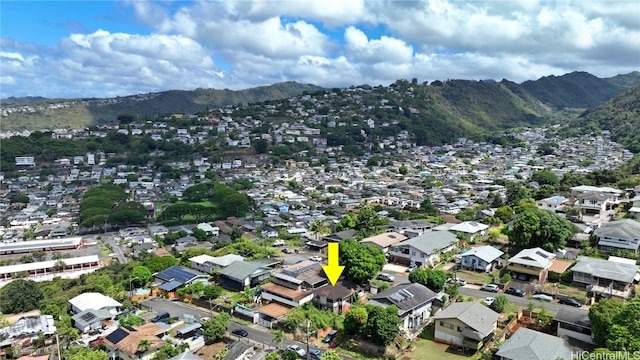 birds eye view of property with a mountain view