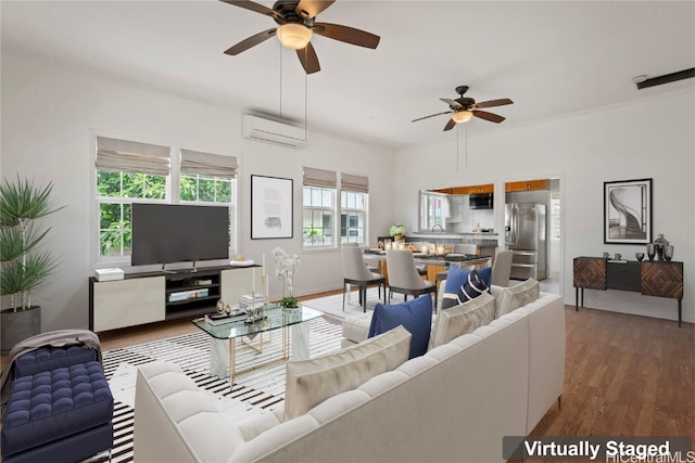 living room featuring ceiling fan, a wall mounted air conditioner, and dark hardwood / wood-style flooring