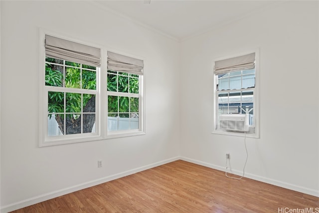 unfurnished room with light hardwood / wood-style flooring