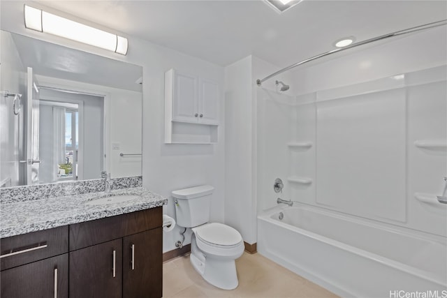 full bathroom featuring vanity, shower / washtub combination, toilet, and tile patterned floors