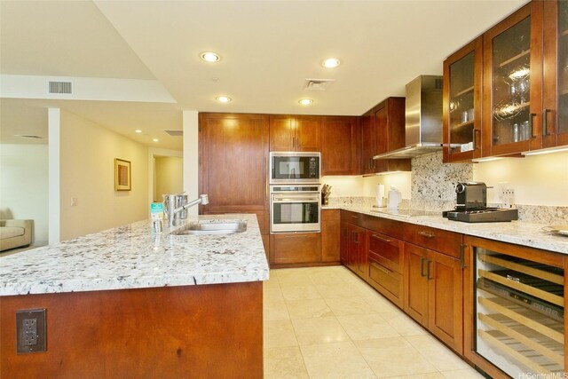 223 Saratoga Rd Unit 2607, Honolulu, HI 96815 - kitchen featuring stainless steel appliances, wine cooler, wall chimney exhaust hood, recessed lighting, and glass insert cabinets