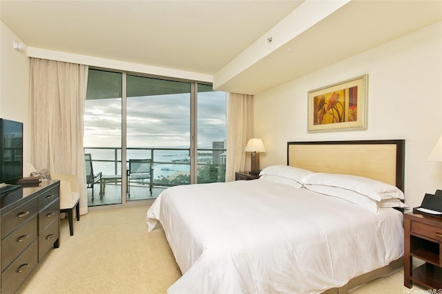 223 Saratoga Rd Unit 2607, Honolulu, HI 96815 - bedroom featuring access to outside, light carpet, and floor to ceiling windows