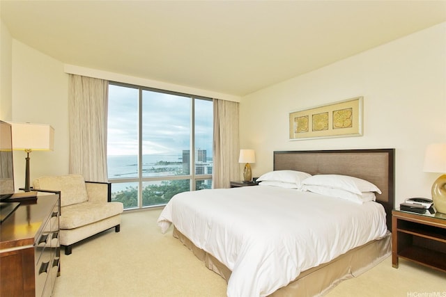 223 Saratoga Rd Unit 2607, Honolulu, HI 96815 - carpeted bedroom featuring expansive windows and a water view
