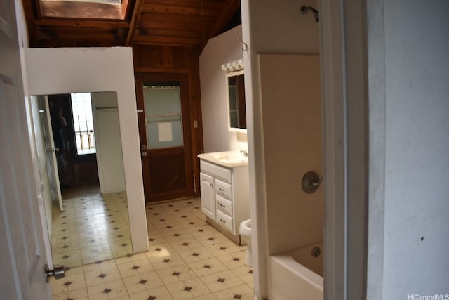 45-55 Lilipuna Rd Unit A, Kaneohe, HI 96744 - full bath with vanity,  shower combination, vaulted ceiling, and tile patterned floors